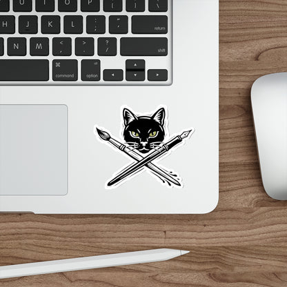 CreativeCat - Black Cat & Art Tools Die-Cut Sticker — Artistic Cat Head with Crossed Paintbrush & Pen