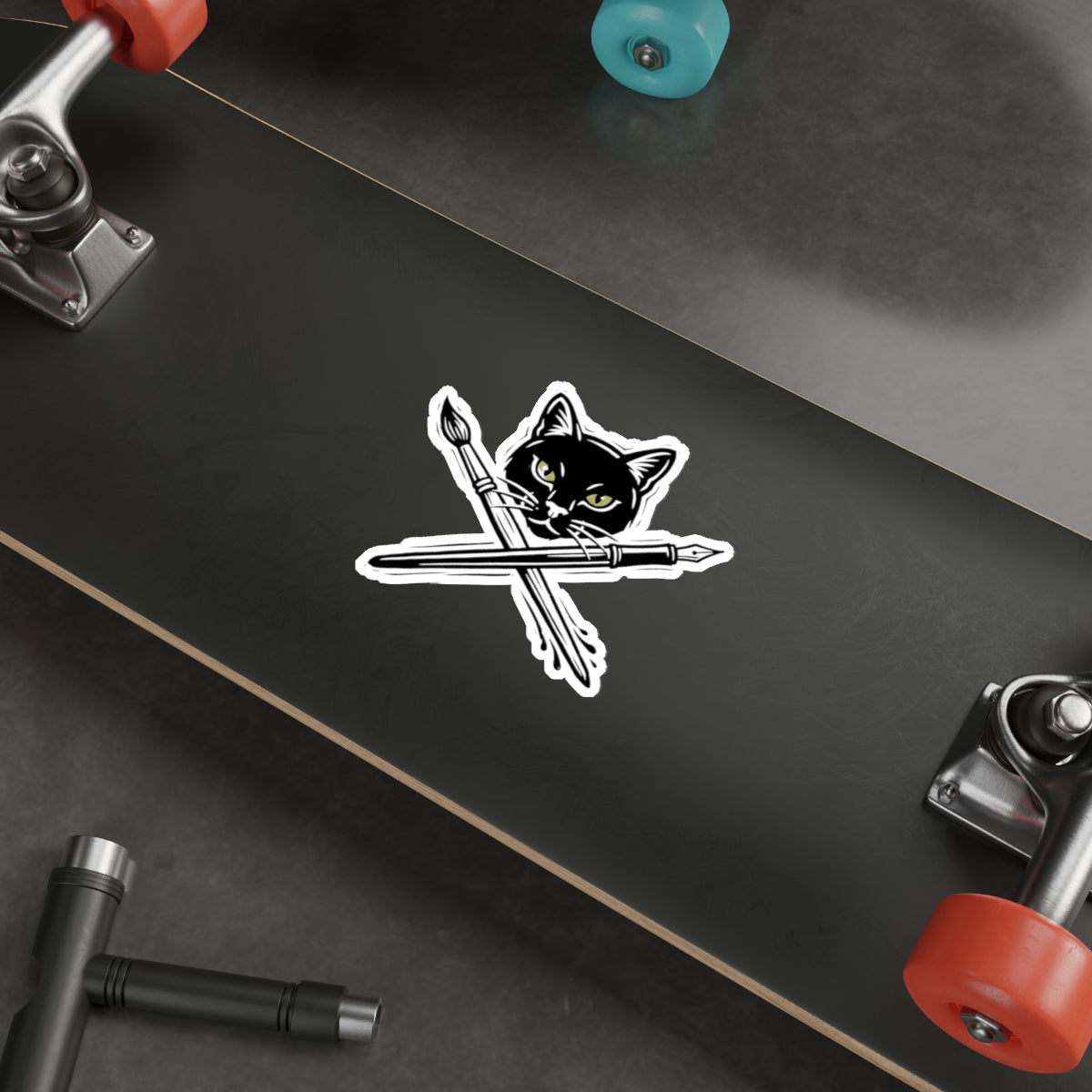 CreativeCat - Black Cat & Art Tools Die-Cut Sticker — Artistic Cat Head with Crossed Paintbrush & Pen