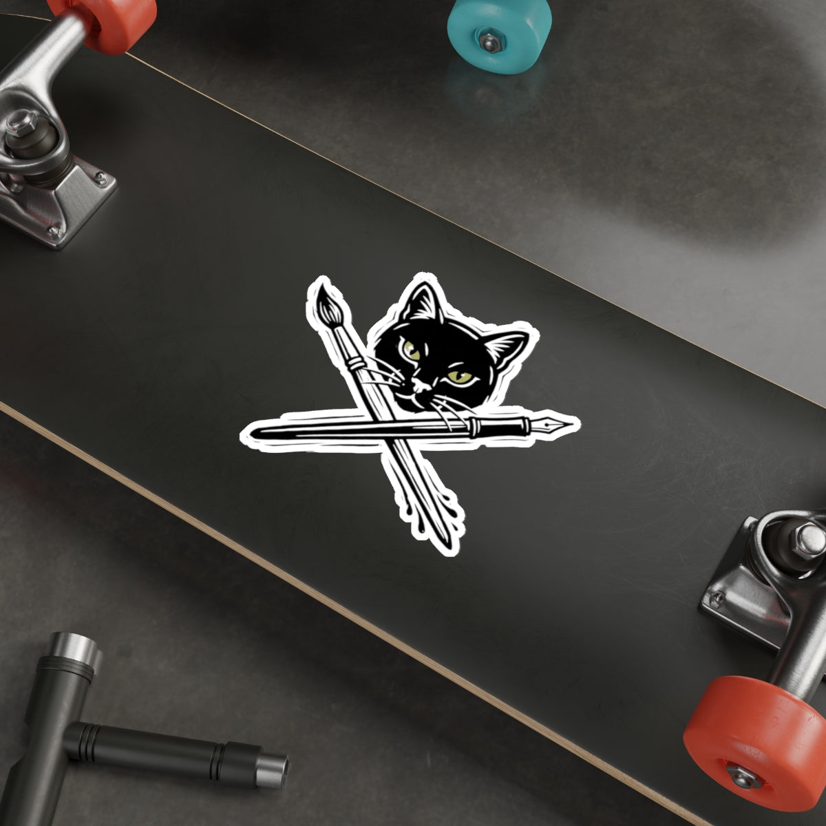 CreativeCat - Black Cat & Art Tools Die-Cut Sticker — Artistic Cat Head with Crossed Paintbrush & Pen